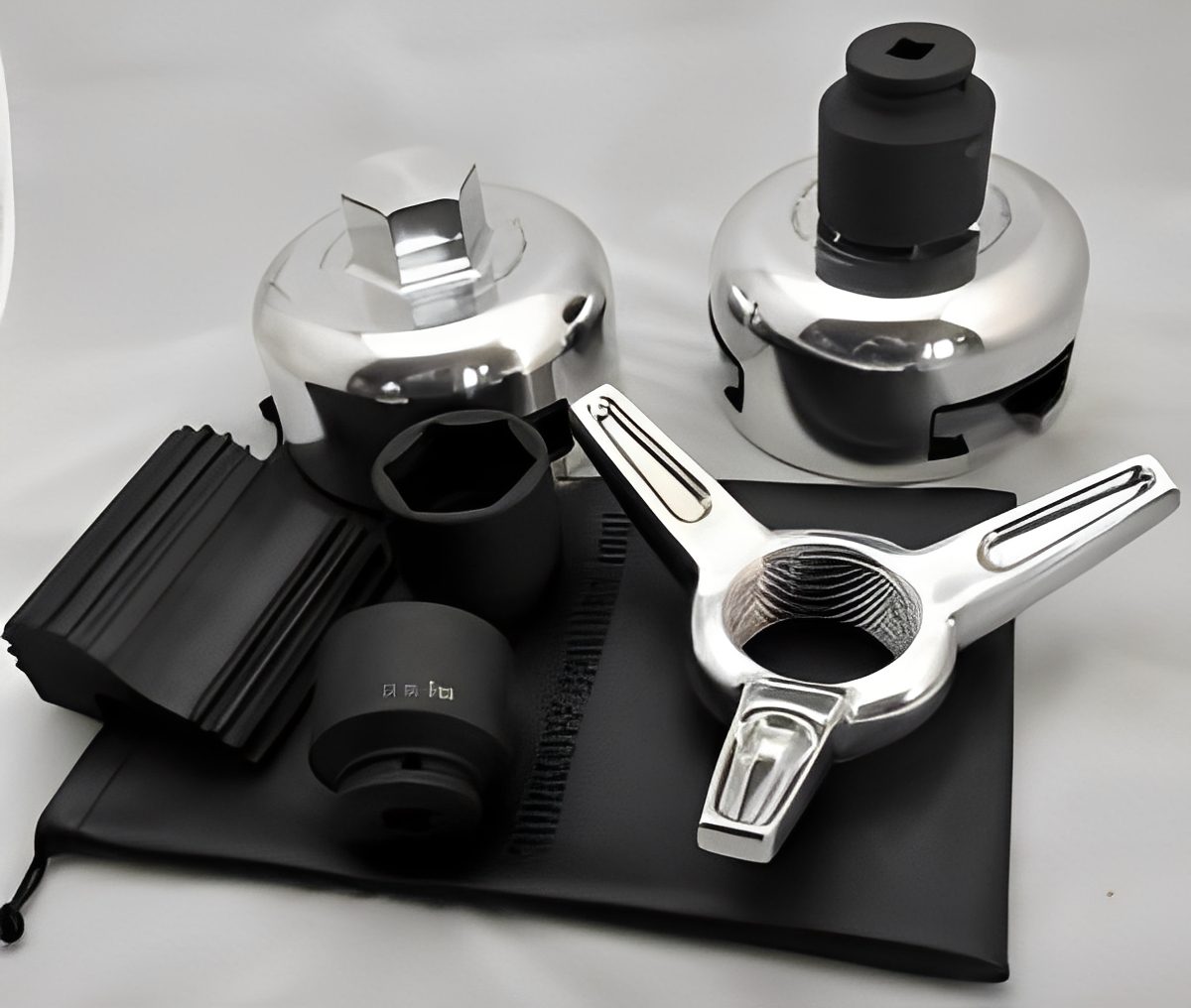 Car wheel accessories and tools on display.