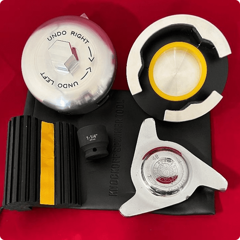 Automotive tools on red background.