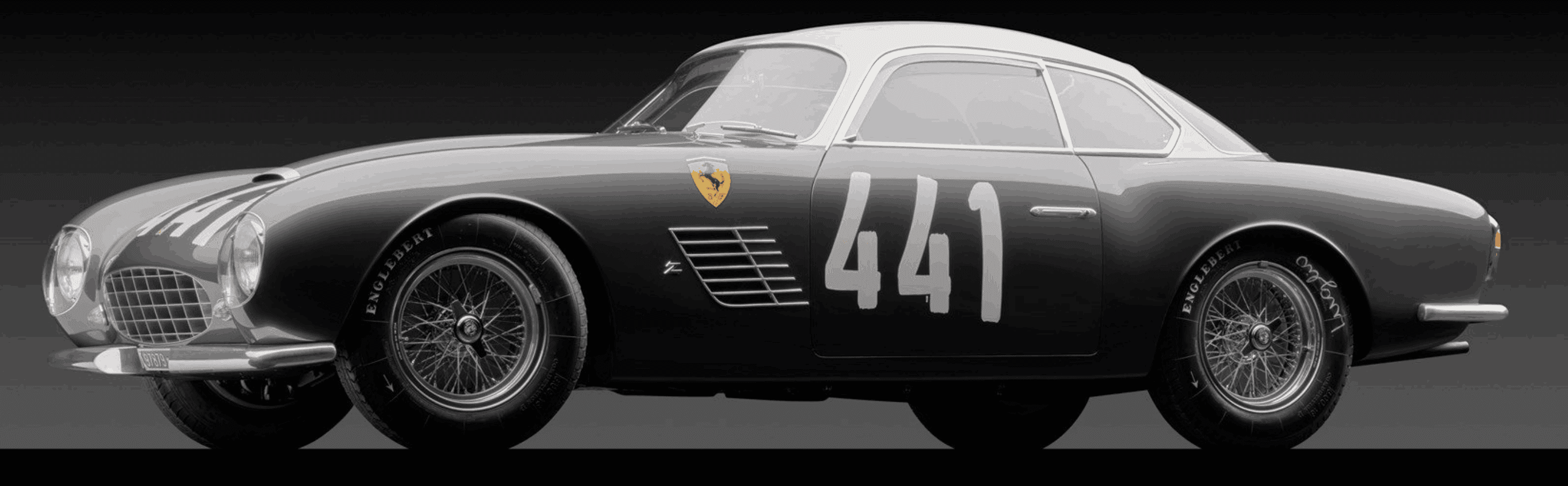Vintage black sports car with number 441.
